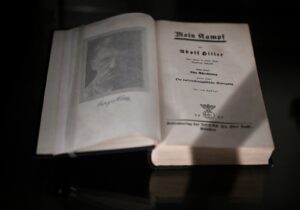 Open book with text and portrait